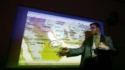 David Barclay, Educational Technology & e-Learning Co-ordinator at Abu Dhabi Men's College, displays the capabilities of the new modern classroom.