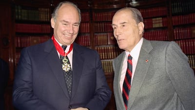 The Aga Khan, left, with former French president Francois Mitterrand at the Elysee Palace on November 7, 1990. AFP