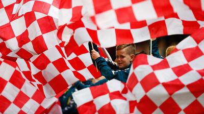 Stoke City supporters wave flags prior to the Barclays Premier League match between Stoke City and Chelsea at Britannia Stadium in Stoke on Trent, England. Laurence Griffiths / Getty Images