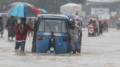 A flooded road in a suburb of Colombo. EPA