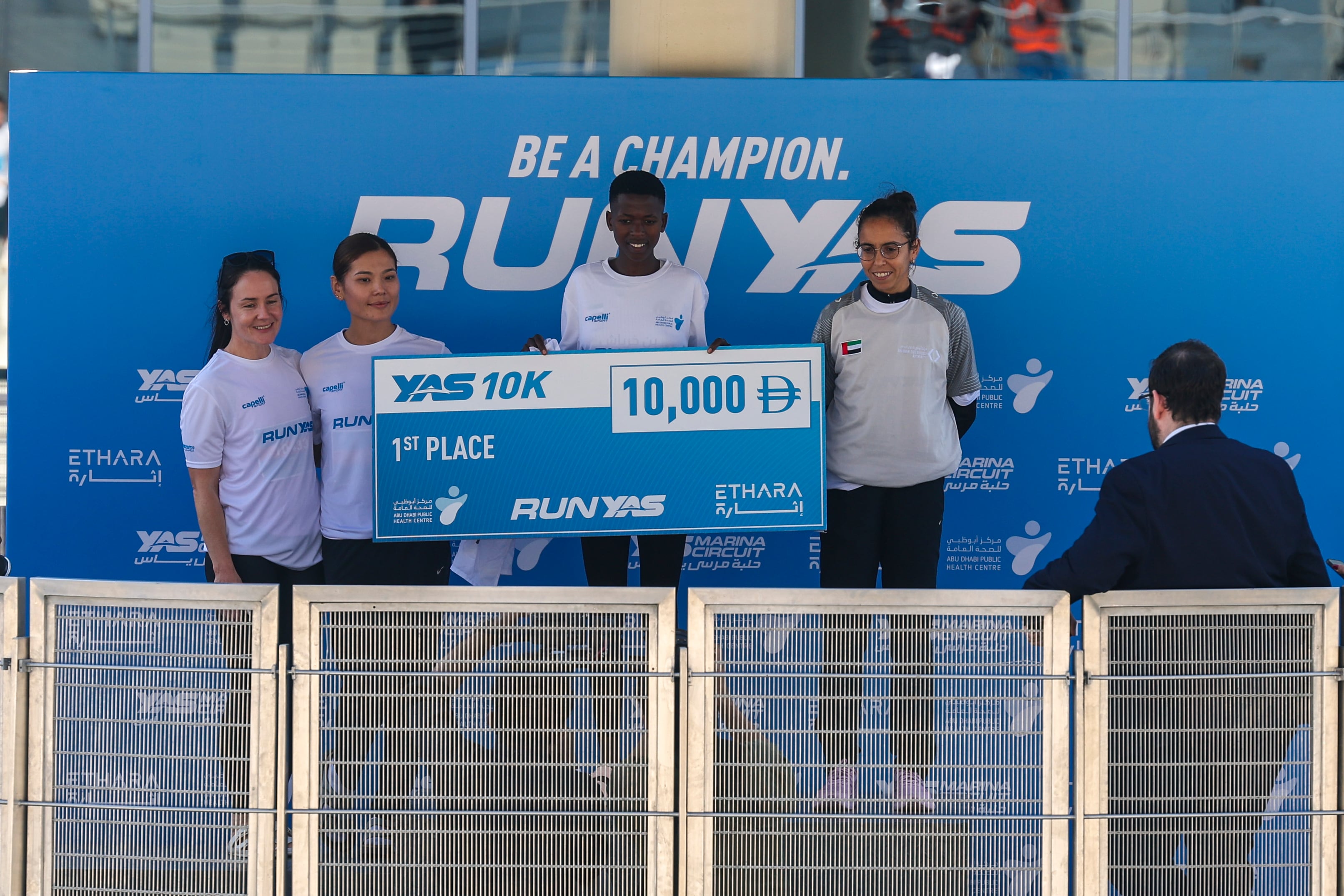 Women's 10k winners receive their awards at RunYas 2026