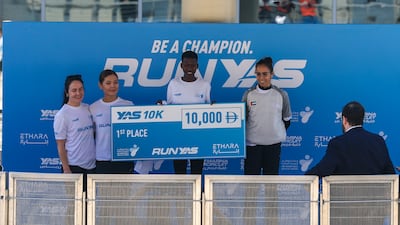 Women's 10k winners receive their awards at RunYas 2026
