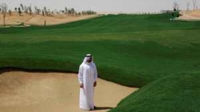 Abdulla Al Gurg, the project director for the Tiger Woods Dubai, poses for a portrait at the fifth hole of the course.
