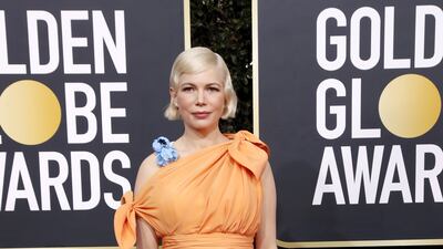 In orange Louis Vuitton gown for the 77th annual Golden Globe Awards in Beverly Hills on January 5, 2020. EPA