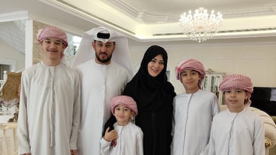 Ahmed, second right, with, from left, his brother Ali, who is 17, his father Nader Al Mousawi, his mother Eiman Al Aleeli, his brother Eisah, who is 7, and his brother Abdullah, who is 10.