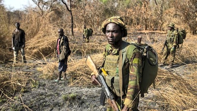 After days of pursuit, Chinko's rangers have caught two suspected poachers deep in the Chinko bush. A raid on a their camp uncovered shotguns, machetes and carcasses of antelope, buffalo, crocodile, hippo and monkey. Photo: Jack Losh
