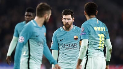 Barcelona forward Lionel Messi reacts during their Uefa Champions League game against Paris Saint-Germain. Yoan Valat / EPA