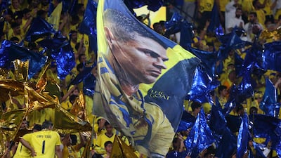 Nassr fans before the start of the match at the Al Awwal Park in Riyadh. AFP