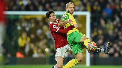 Norwich City's Finnish striker Teemu Pukki vies with Manchester United's Swedish defender Victor Lindelof. AFP