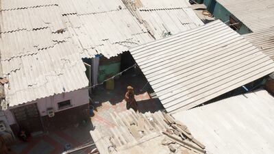 The NGO is helping poor families paint their roofs white reflective paint to keep indoor temperatures at bearable levels during summer