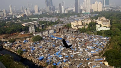 Some say tackling the massive network of slums is an area that Mumbai needs to grapple with, and the government's plan for smart cities will not solve the problem. Rafiq Maqbool/AP Photo