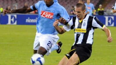 Juventus' Giorgio Chiellini, right, and Napoli's Marcelo Zalayeta tussle for the ball.