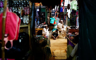 Sudanese shop owners wait for customers at a bazaar in Khartoum, Sudan, June 24, 2019. Reuters