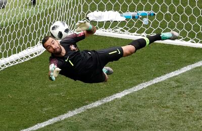 Portugal goalkeeper Rui Patricio saves a Younes Belhanda header. Christian Hartmann / Reuters