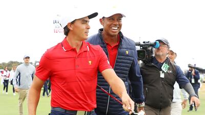Tiger Woods and Rickie Fowler of the United States team celebrate after they won the Presidents Cup 16-14. Getty