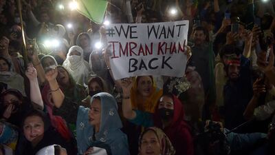 Mr Khan's supporters march in Peshawar. AFP