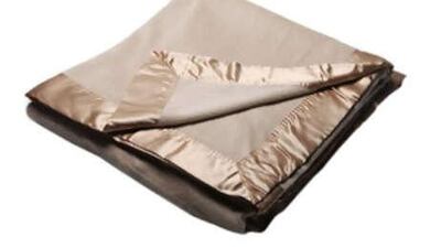 Silk-and-cashmere blanket with silk-satin edging by Ginger Lily.