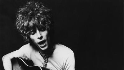 David Bowie plays an acoustic Espana 12-string guitar to promote the album Space Oddity in 1969 in London. Michael Ochs Archives / Getty Images