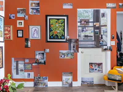 Guanyu Xu's series features domestic interiors overlayed with found and personal images on walls, doors and furniture. Photo: Guanyu Xu