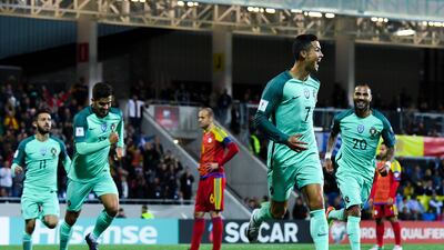 Cristiano Ronaldo celebrates after scoring the opening goal for Portugal in the 2018 World Cup qualifier against Andorra. David Ramos / Getty Images