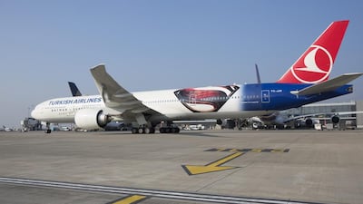 The Turkish Airlines airplane promoting the movie Batman versus Superman: Dawn of Justice arrives at Heathrow airport. John Phillips / Getty Images for Turkish Airlines