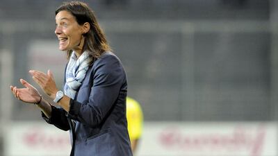 Clermont-Ferrand's French coach Corinne Diacre reacts during the French Ligue 2 football match between Brest and Clermont-Ferrand on August 4, 2014 at the Francis Le Ble stadium in Brest, western France. Diacre is the first woman to lead a men's professional team in a major European country. AFP PHOTO / FRED TANNEAU