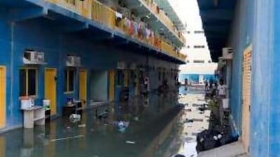At Al Quoz, stagnant sewage water has flooded the complex, causing unbearable conditions for the workers.