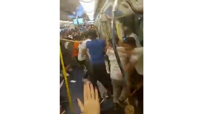 Protesters trying to return home were attacked inside a train station by assailants who appeared to target the pro-democracy demonstrators. Lam Cheuk-ting via AP