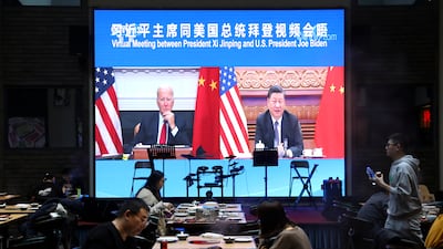 Chinese President Xi Jinping attends a virtual meeting with US President Joe Biden via video link, at a restaurant in Beijing, China, on November 16. Reuters
