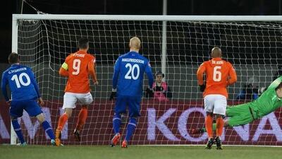 Gylfi Sigurdsson, left, and Iceland upset the Netherlands in their Euro 2016 qualifier in October. Olaf Kraak / EPA / October 13, 2014
