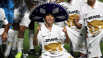 Player of Pumas Unam celebrate after winning the U14 Mina Cup final.