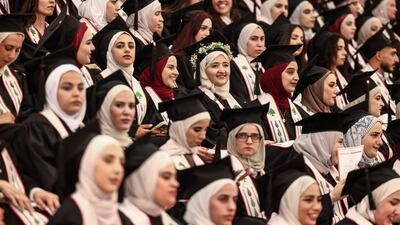 Palestinian students attend Birzeit University's first graduation ceremony since the start of the Gaza war on October 7. AFP