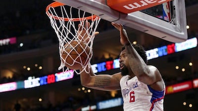 DeAndre Jordan of the LA Clippers dunks against the Houston Rockets on Sunday during Game 4 of their NBA play-offs second round series. Stephen Dunn / Getty Images / AFP / May 10, 2015