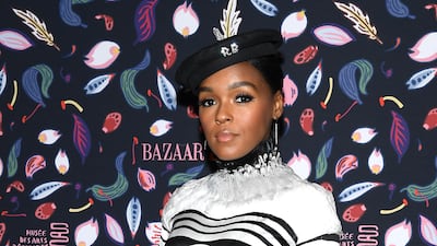 Janelle Monae, wearing a black and white optical illusion Jean Paul Gaultier dress, attends the Harper's Bazaar Exhibition at Paris Fashion Week on February 26, 2020. Getty Images