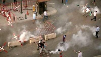 Police and protesters clash after the funeral of Brig. Gen. Wissam Al Hassan in Beirut. His assassination has exacerbated tensions simmering in Lebanon since Syria’s uprising against Bashar Al Assad began.