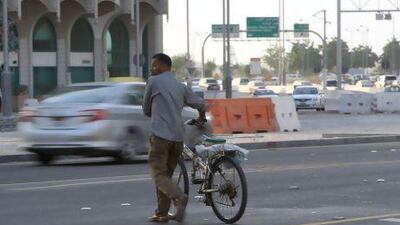 People regularly dodge vehicles to avoid a 300-metre walk to a junction.