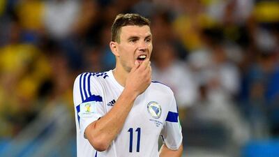 Edin Dzeko reacts during Bosnia's 1-0 loss to Nigeria on Saturday at the 2014 World Cup in Cuiaba, Brazil. Stu Forster / Getty Images
