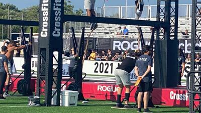 Events include peg board and rope climbs, lifting weights, pushing heavy contraptions over long stretches, pull-ups, handstand walks, distance swims and obstacle courses.