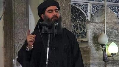 An undated file image of a frame from video released by ISIL showing their leader Abu Bakr Al Baghdadi delivering a speech in an unknown location. Iraqi military on 11 October 2015 claimed it hit a convoy allegedly carrying Al Baghdadi in an air strike in western Iraq. EPA