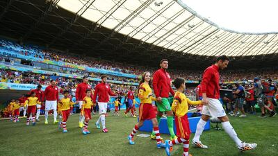 Frank Lampard of England leads his team to the field with their player escorts prior to the 2014 World Cup match on Tuesday against Costa Rica. Richard Heathcote / Getty Images