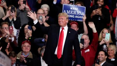 President Donald Trump takes the stage to speak at a campaign rally in Indianapolis. AP/Michael Conroy