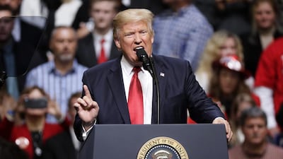 The US president Donald Trump speaks at a rally in Nashville. Mark Humphrey / AP Photo