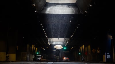 Downtown Los Angeles in the heavy rain. A winter storm crossed California, forcing hundreds of evacuations while threatening flooding and travel delays throughout the Christmas period for much of the Golden State. AFP