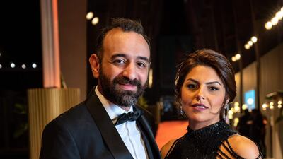 Egyptian director Amr Salama with his partner at El Gouna Film Festival. AFP