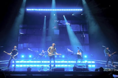 Snow Patrol is made up of Paul Wilson, Jonny Quinn, Gary Lightbody, Johnny McDaid and Nathan Connolly. Shutterstock.