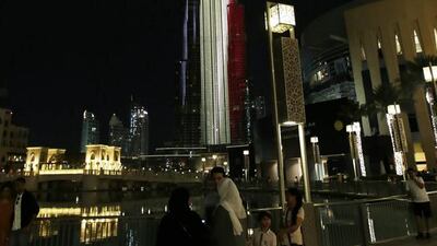 The Burj Khalifa, the world’s tallest tower, is illuminated in colours of the Belgian flag in tribute to victims of the Brussels terror attacks that killed around 35 people, in Dubai. AFP / STR