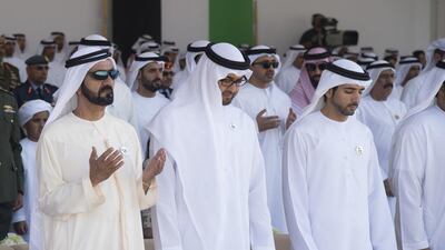 Sheikh Mohammed bin Rashid, Vice-President and Ruler of Dubai, Sheikh Mohammed bin Zayed, Crown Prince of Abu Dhabi and Deputy Supreme Commander of the Armed Forces, and Sheikh Hamdan, Crown Prince of Dubai, attend prayer. Mohamed Al Suwaidi / Crown Prince Court - Abu Dhabi