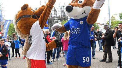 The Leicester City mascots play basketball pre-match. Michael Regan / Getty Images