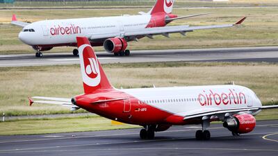 Planes of Air Berlin on the runway of Dusseldorf airport in Germany. Roland Weihrauch / dpa via AP