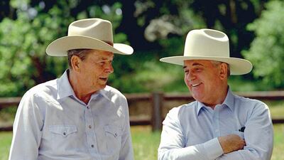 Reagan and Gorbachev don cowboy hats while enjoying a moment at Reagan's Rancho del Cielo, near Santa Barbara, California, in May 1992. AP